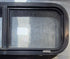 Used Black Radius Opening Window : 30 1/4" W x 11 3/4" H x 1 3/4" - Young Farts RV Parts