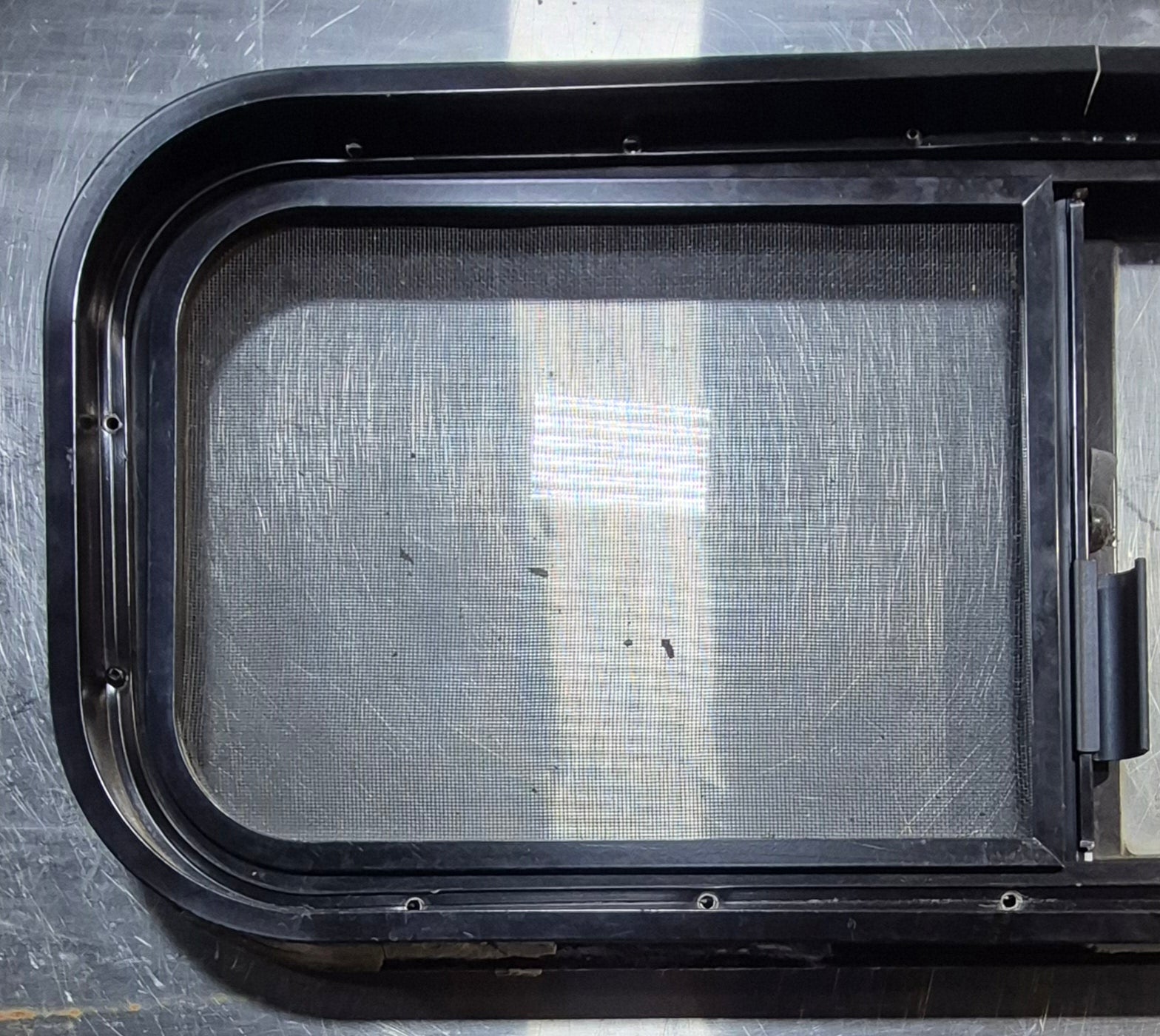 Used Black Radius Opening Window : 30 1/4" W x 11 3/4" H x 1 3/4" - Young Farts RV Parts