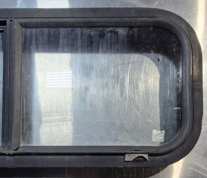 Used Black Radius Opening Window : 30 1/4" W x 11 3/4" H x 1 3/4" - Young Farts RV Parts