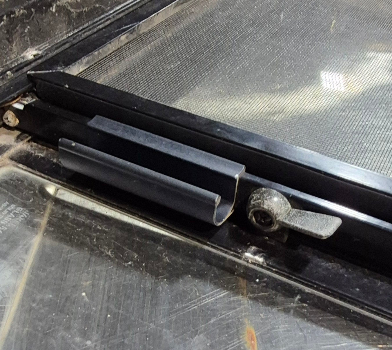 Used Black Radius Opening Window : 30 1/4" W x 11 3/4" H x 1 3/4" - Young Farts RV Parts