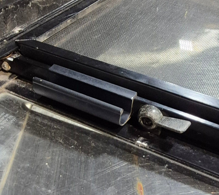 Used Black Radius Opening Window : 30 1/4" W x 11 3/4" H x 1 3/4" - Young Farts RV Parts