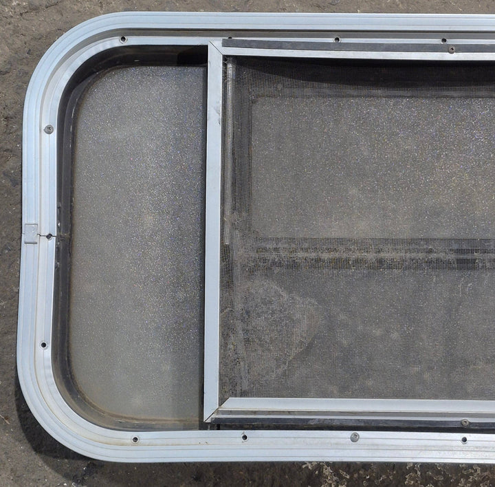 Used Black Radius Opening Window : 30 1/4" x 14 7/8" x 1 3/4" D - Young Farts RV Parts