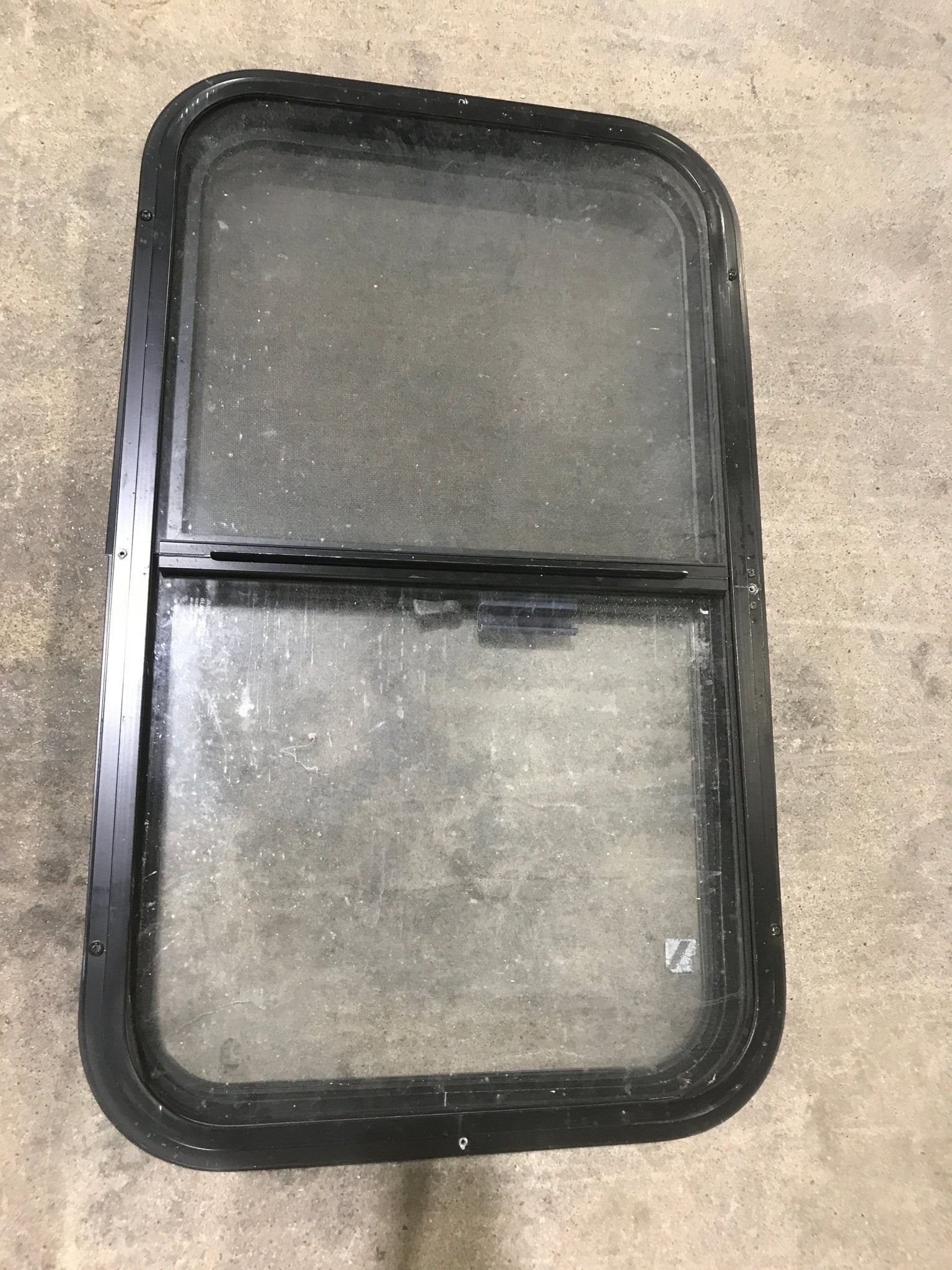 Used Black Radius Opening Window : 30 3/4" W X 18 1/2" H X 2" D - Young Farts RV Parts
