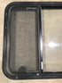 Used Black Radius Opening Window : 34 3/4" W x 23 1/4" H x 2" D - Young Farts RV Parts