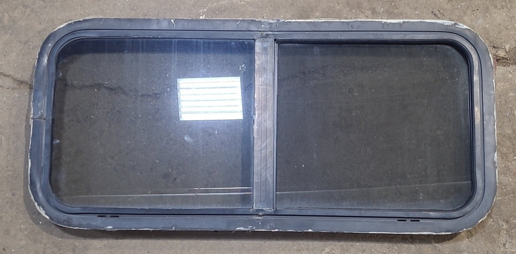 Used Black Radius Opening Window : 35 1/2" W x 15 3/4" H x 2" D - Young Farts RV Parts