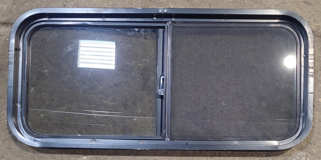 Used Black Radius Opening Window : 35 1/2" W x 15 3/4" H x 2" D - Young Farts RV Parts