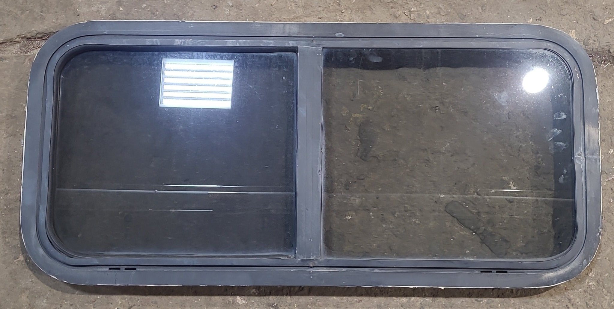 Used Black Radius Opening Window : 35 1/2" W x 15 3/4" H x 2" D - Young Farts RV Parts