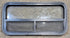 Used Black Radius Opening Window : 35 1/2" W x 17 1/4" H x 1 7/8" - Young Farts RV Parts