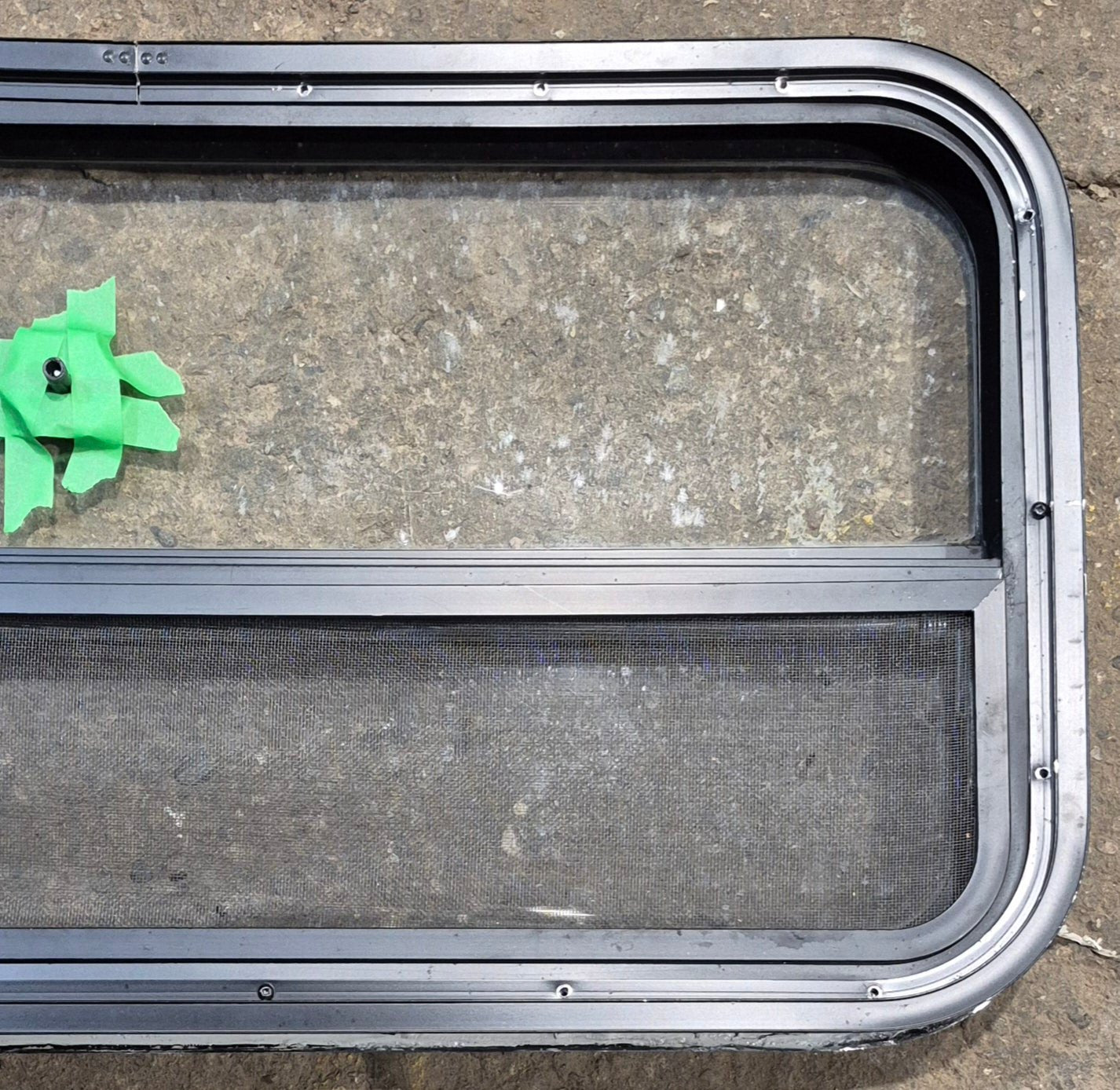Used Black Radius Opening Window : 35 1/2" W x 17 1/4" H x 1 7/8" - Young Farts RV Parts