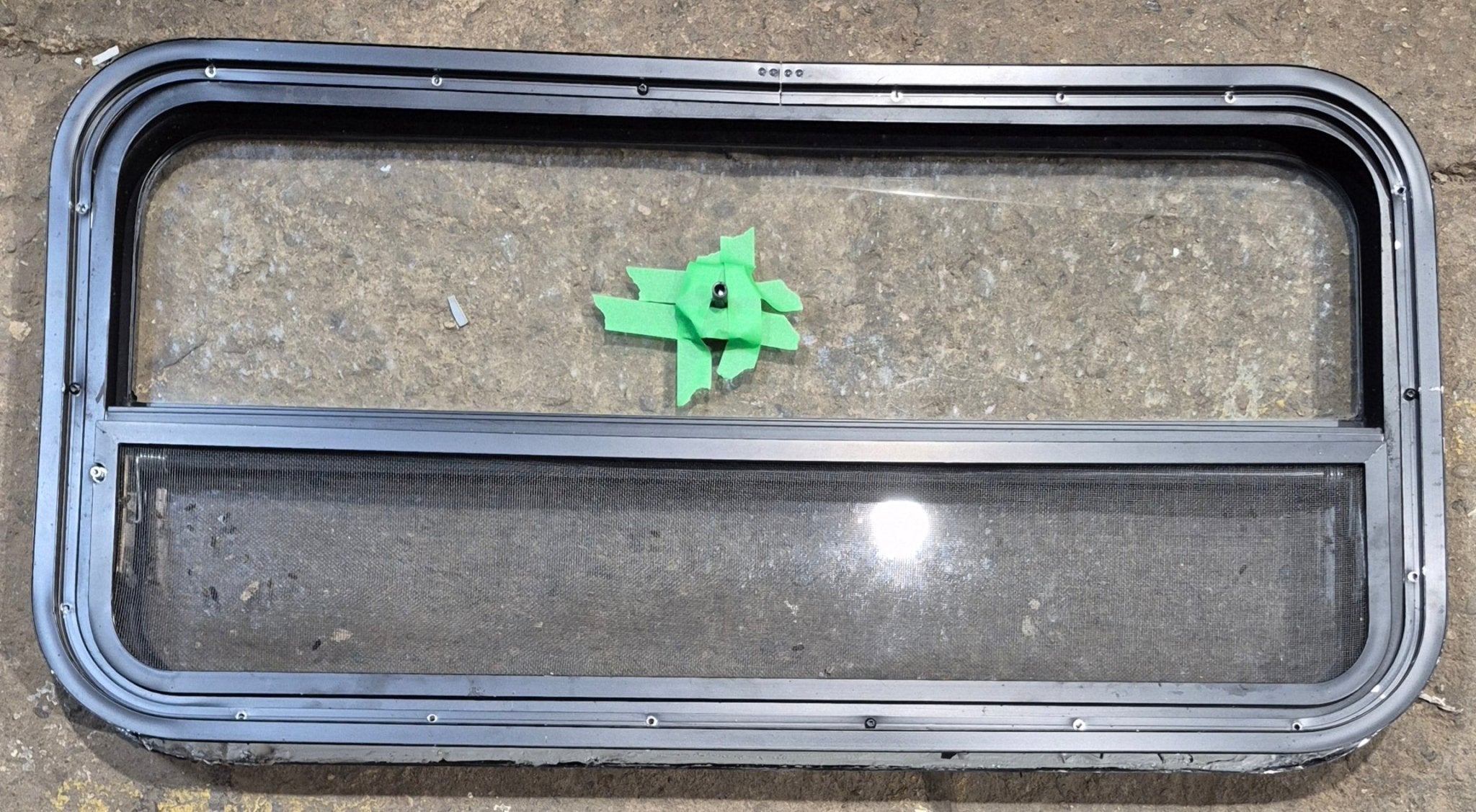 Used Black Radius Opening Window : 35 1/2" W x 17 1/4" H x 1 7/8" - Young Farts RV Parts