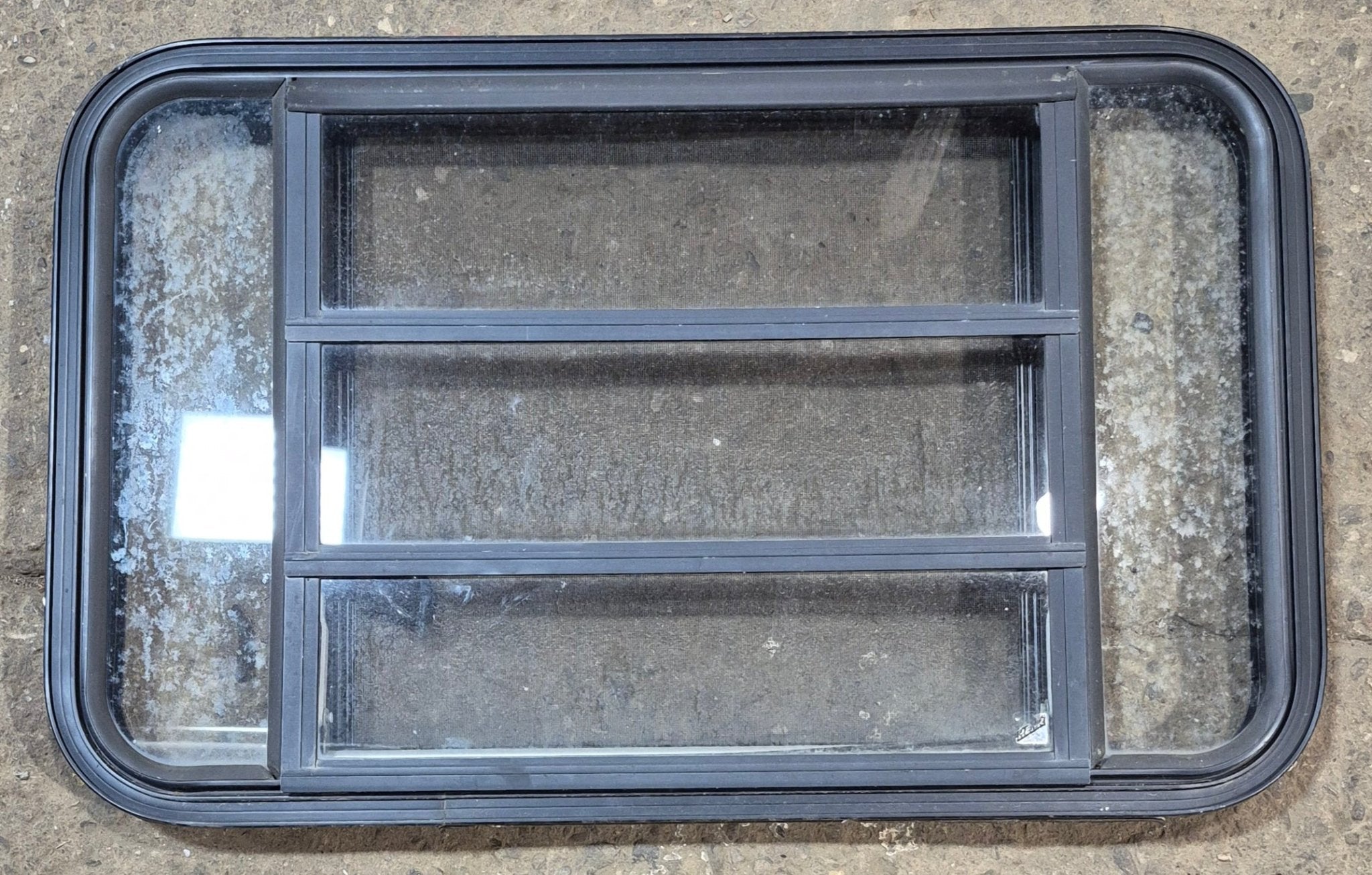 Used Black Radius Opening Window : 35 1/2" W x 21 3/4" H x 1 7/8" - Young Farts RV Parts