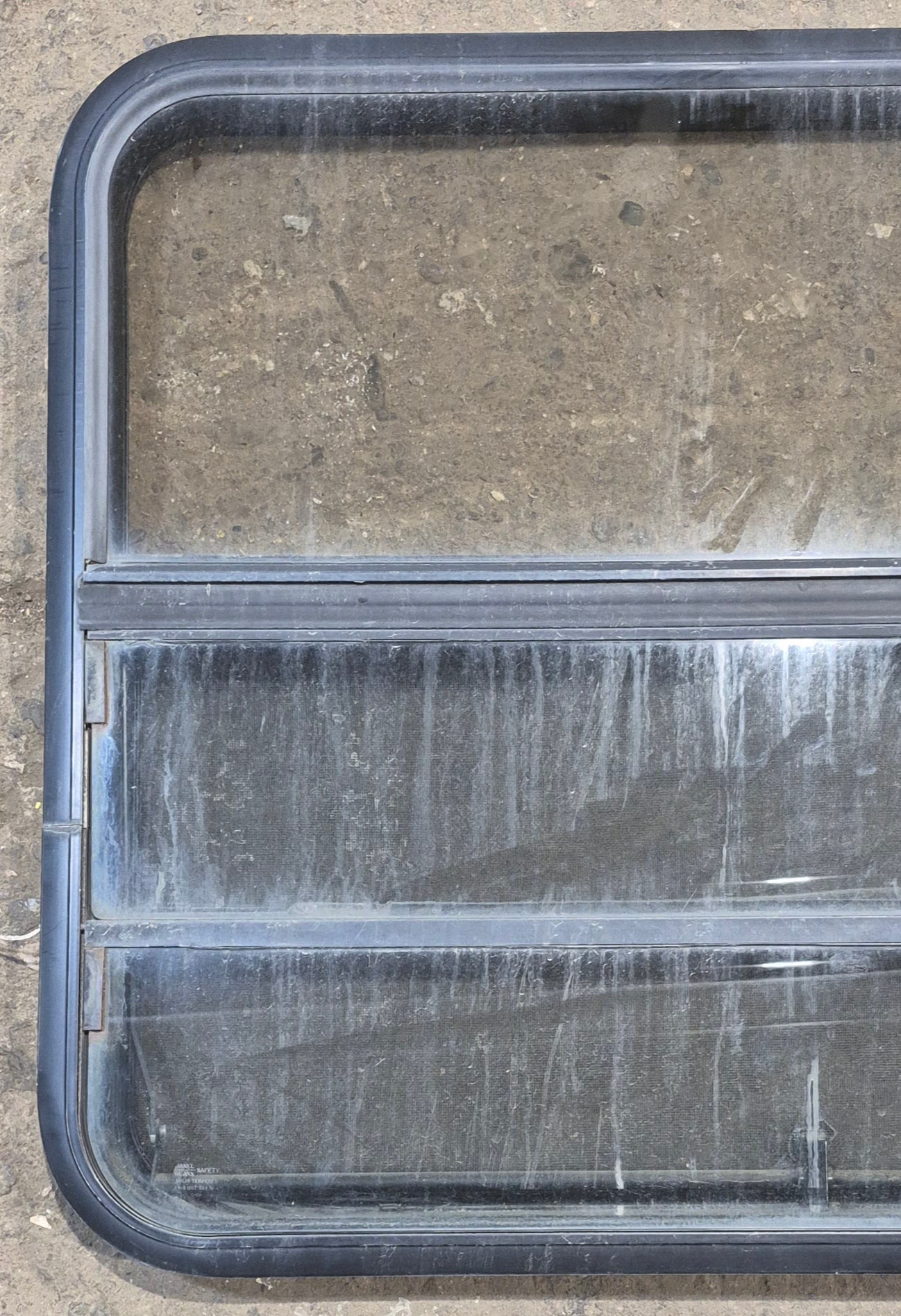 Used Black Radius Opening Window : 35 1/2" W x 28 3/4" H x 1 3/4" - Young Farts RV Parts