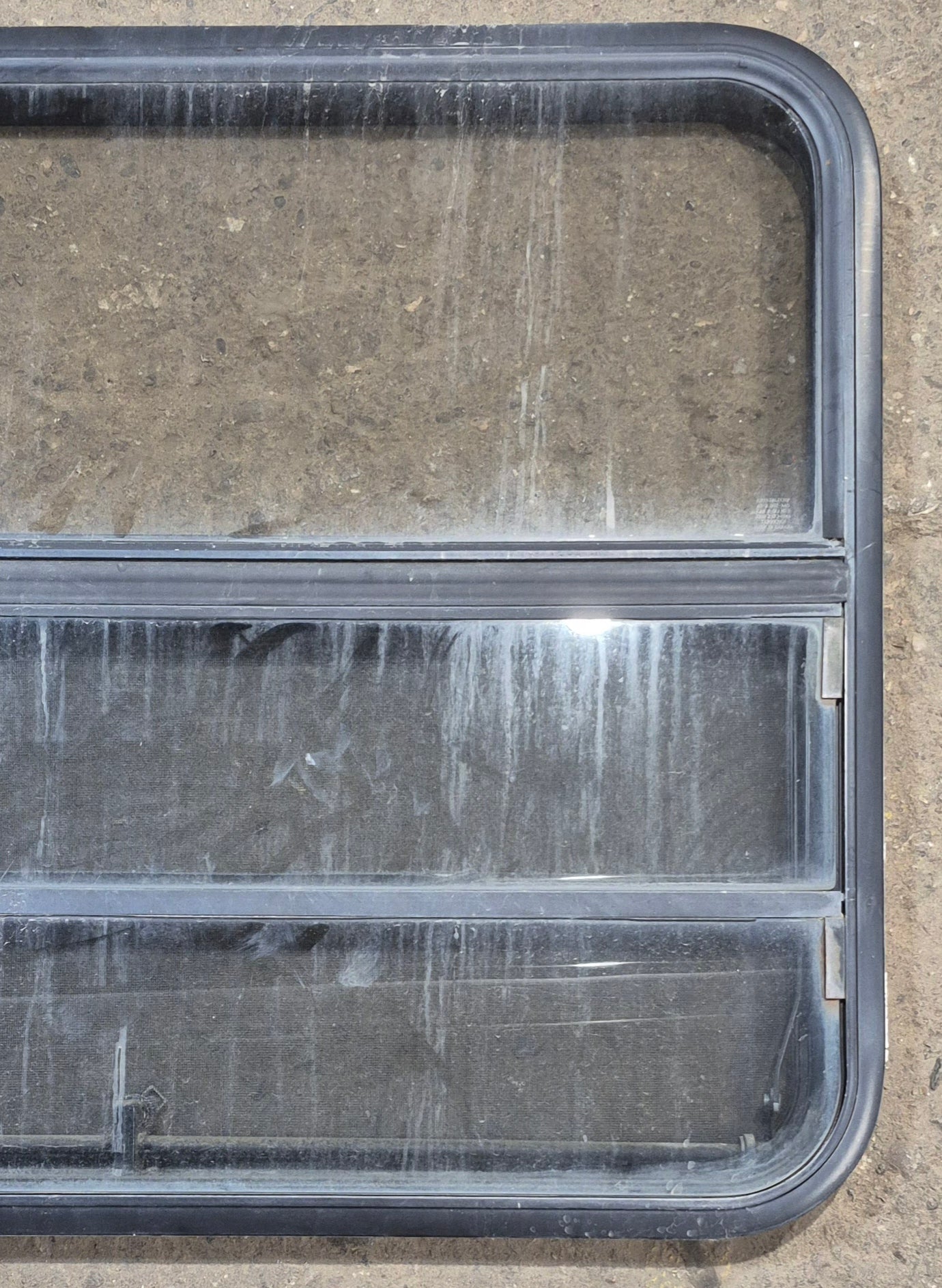 Used Black Radius Opening Window : 35 1/2" W x 28 3/4" H x 1 3/4" - Young Farts RV Parts
