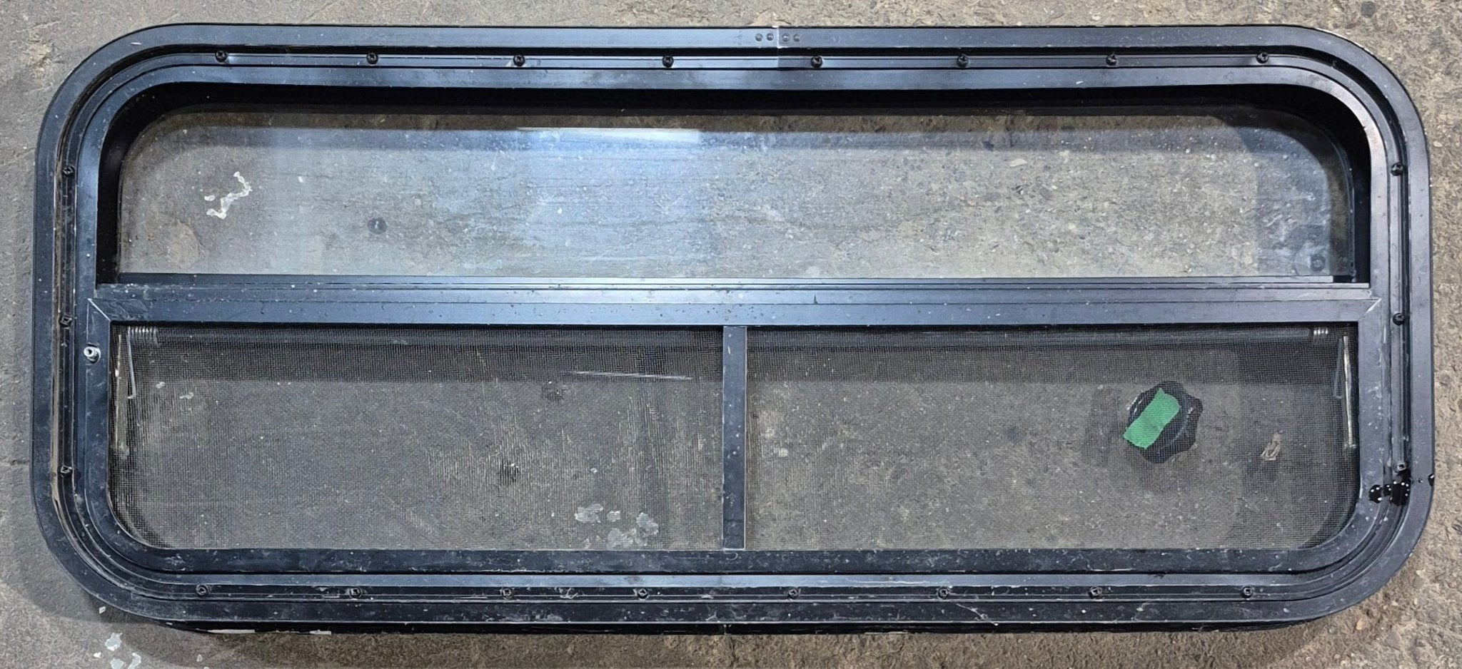 Used Black Radius Opening Window : 35 1/4" W x 14 1/4" H x 1 7/8" - Young Farts RV Parts