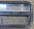 Used Black Radius Opening Window : 35 1/4" W x 14 1/4" H x 1 7/8" - Young Farts RV Parts