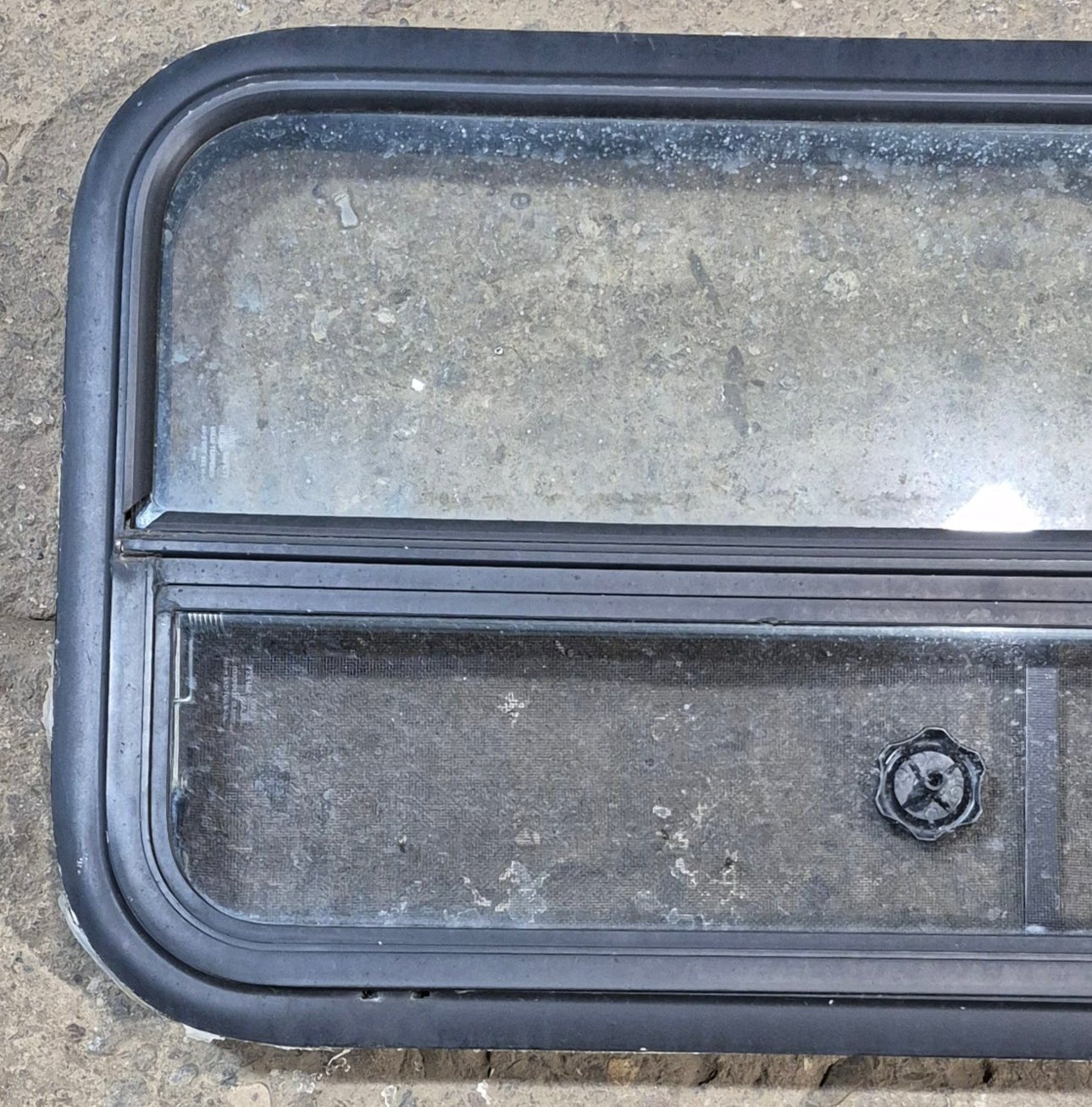Used Black Radius Opening Window : 35 1/4" W x 17 1/4" H x 1 7/8" - Young Farts RV Parts