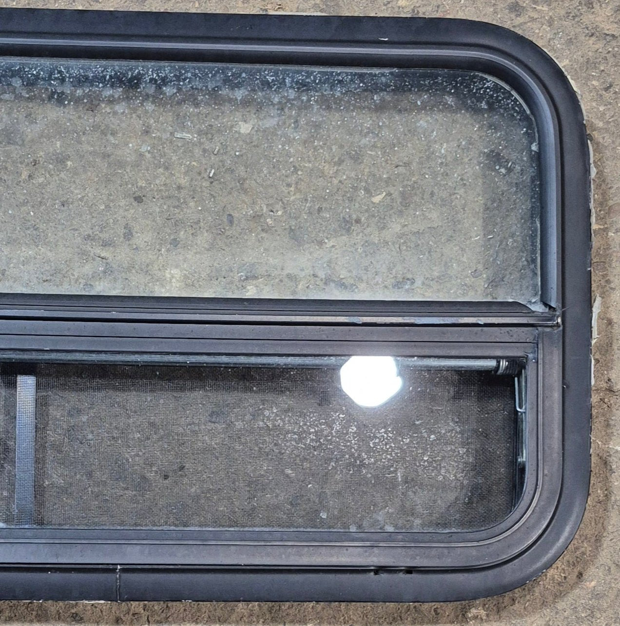 Used Black Radius Opening Window : 35 1/4" W x 17 1/4" H x 1 7/8" - Young Farts RV Parts