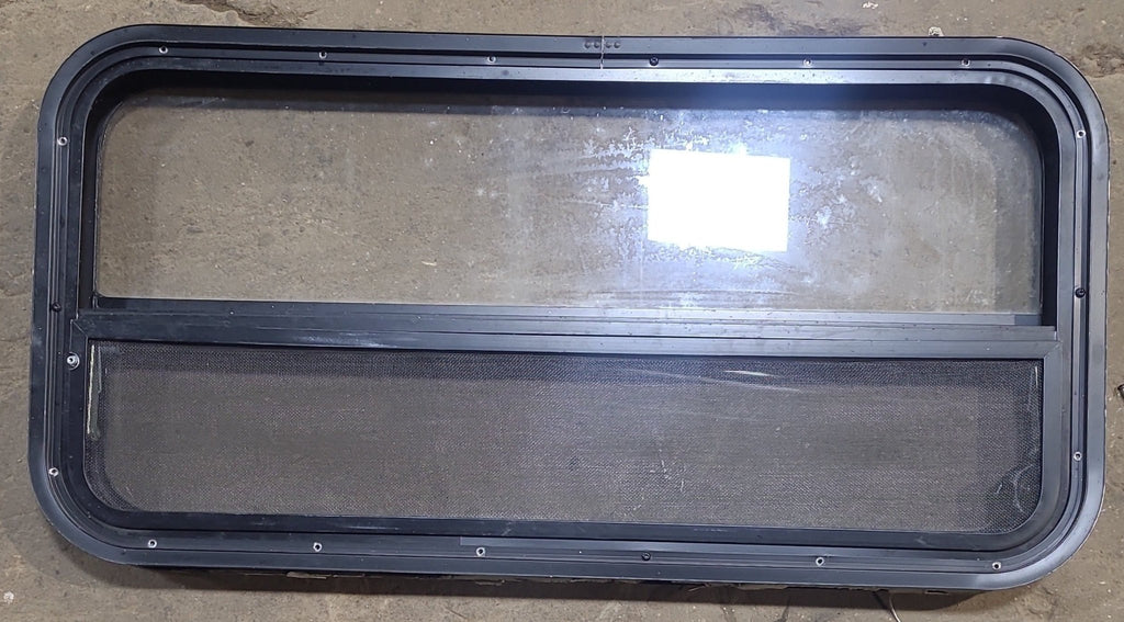 Used Black Radius Opening Window : 35 1/4" W x 17 1/4" H x 1 7/8" D - Young Farts RV Parts