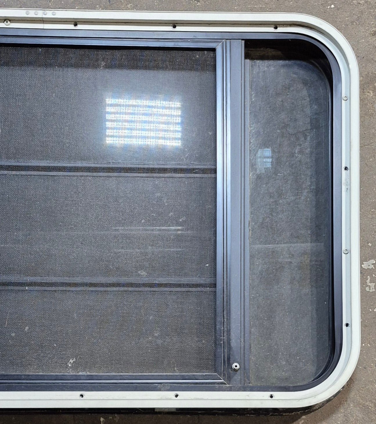 Used Black Radius Opening Window : 35 1/4" W x 21 1/2" H x 1 7/8" - Young Farts RV Parts