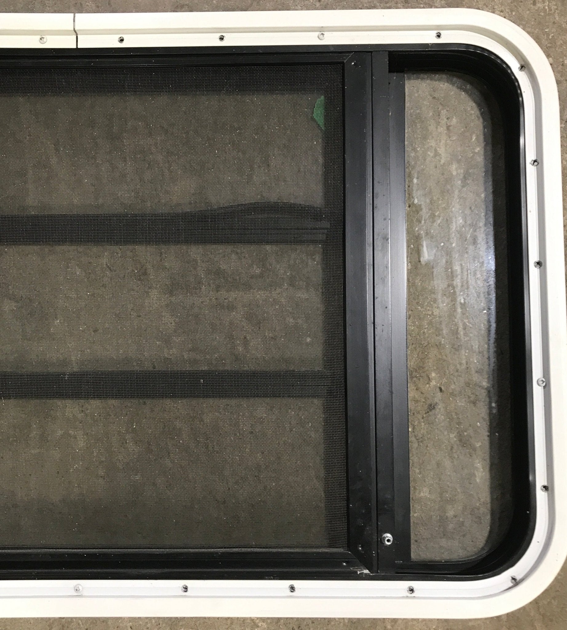 Used Black Radius Opening Window : 35 1/4" W x 21 1/4" H x 1 7/8" D - Young Farts RV Parts