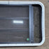 Used Black Radius Opening Window - 35 1/8" X 21 1/4" X 1 7/8" - Young Farts RV Parts
