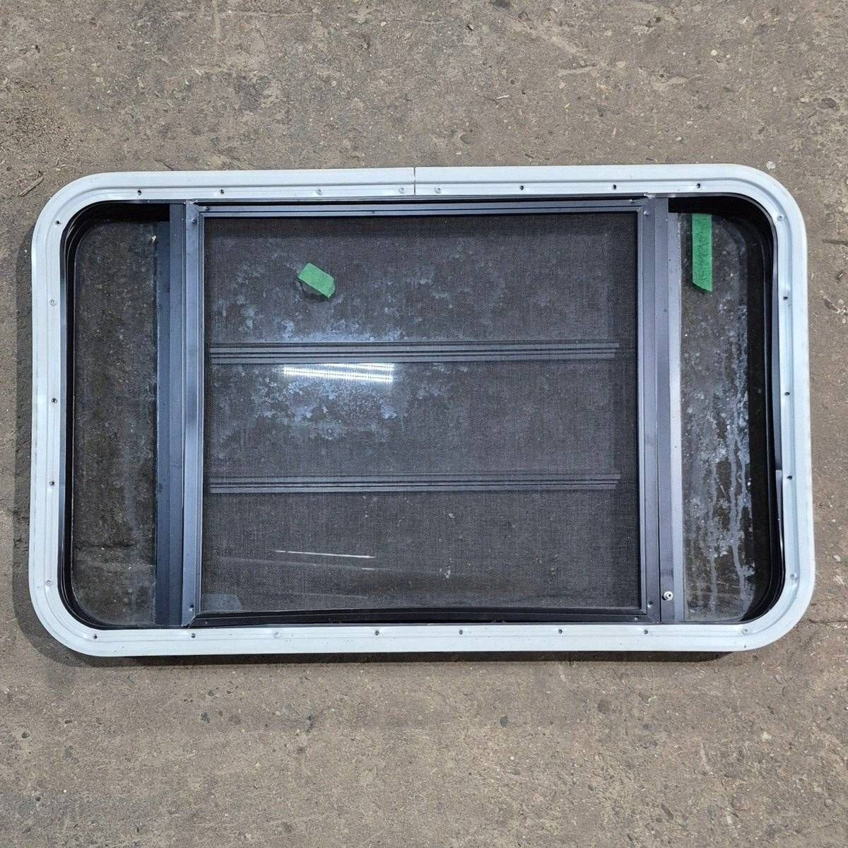 Used Black Radius Opening Window - 35 1/8" X 21 1/4" X 1 7/8" - Young Farts RV Parts