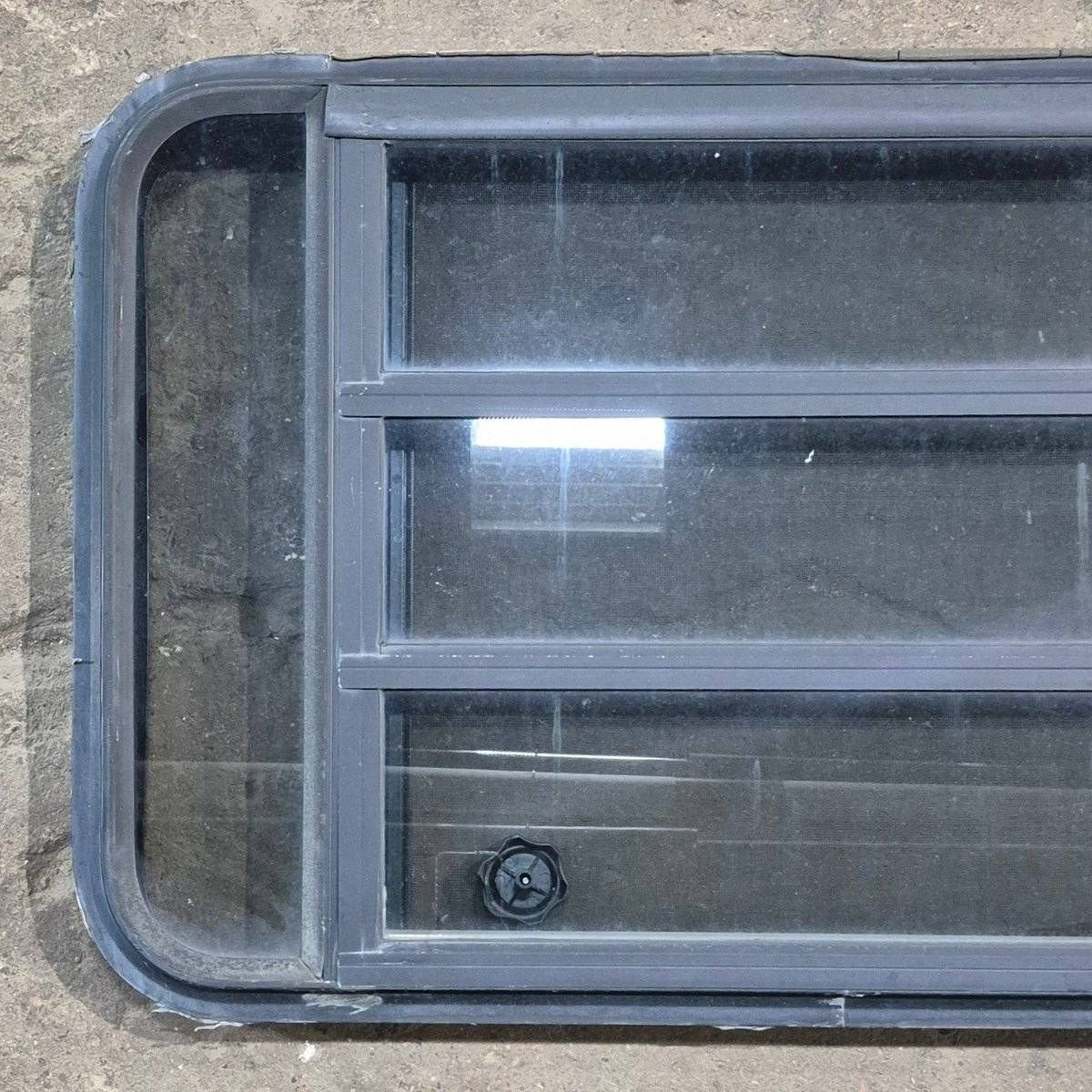 Used Black Radius Opening Window - 35 1/8