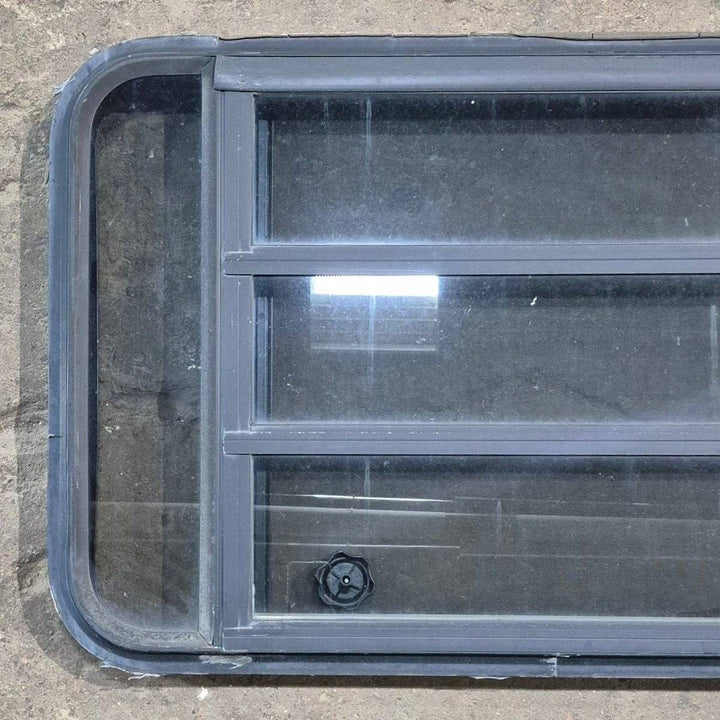 Used Black Radius Opening Window - 35 1/8" X 21 1/4" X 1 7/8" - Young Farts RV Parts