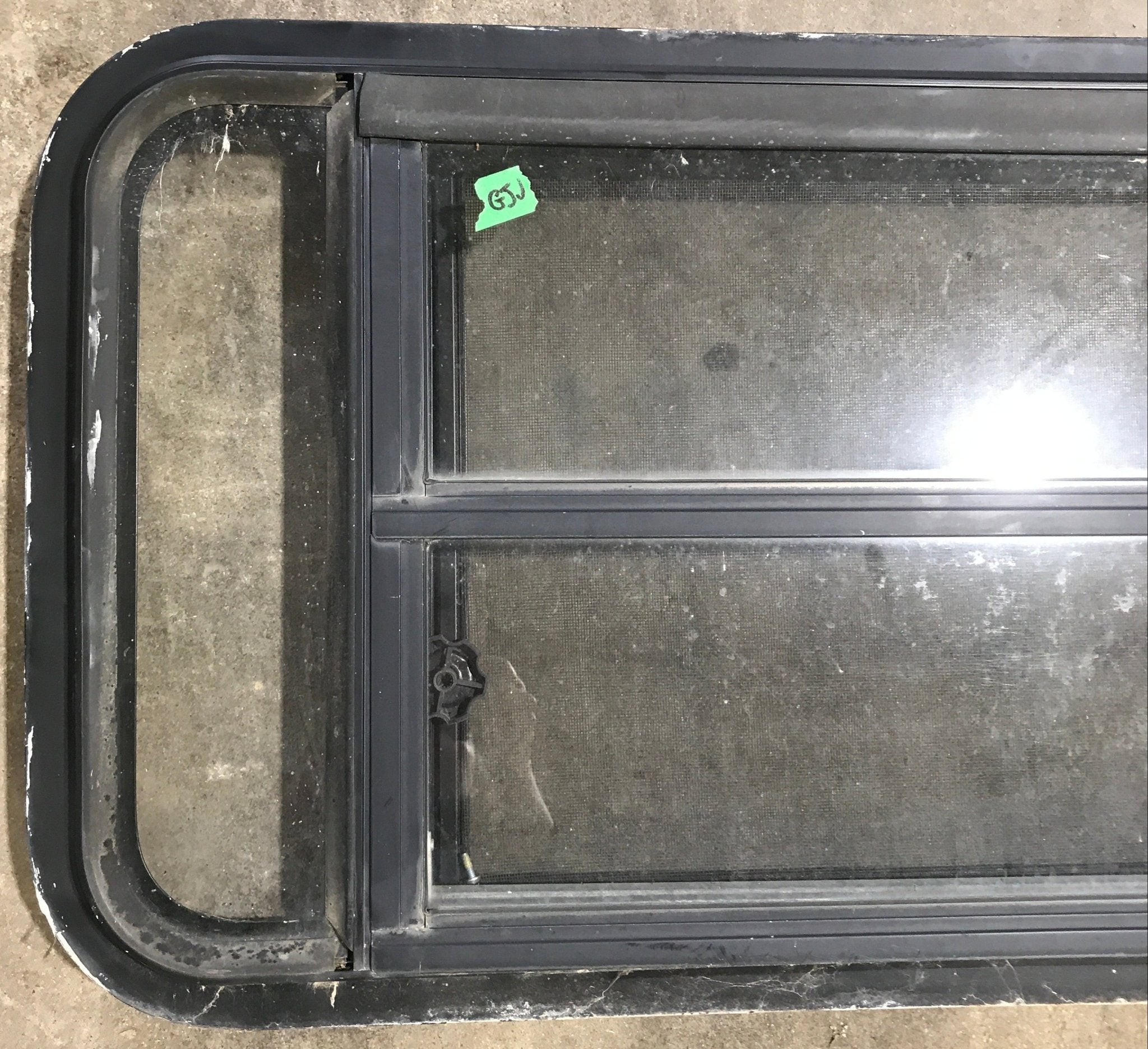 Used Black Radius Opening Window : 35" W x 17 1/4" H x 1 7/8" D - Young Farts RV Parts