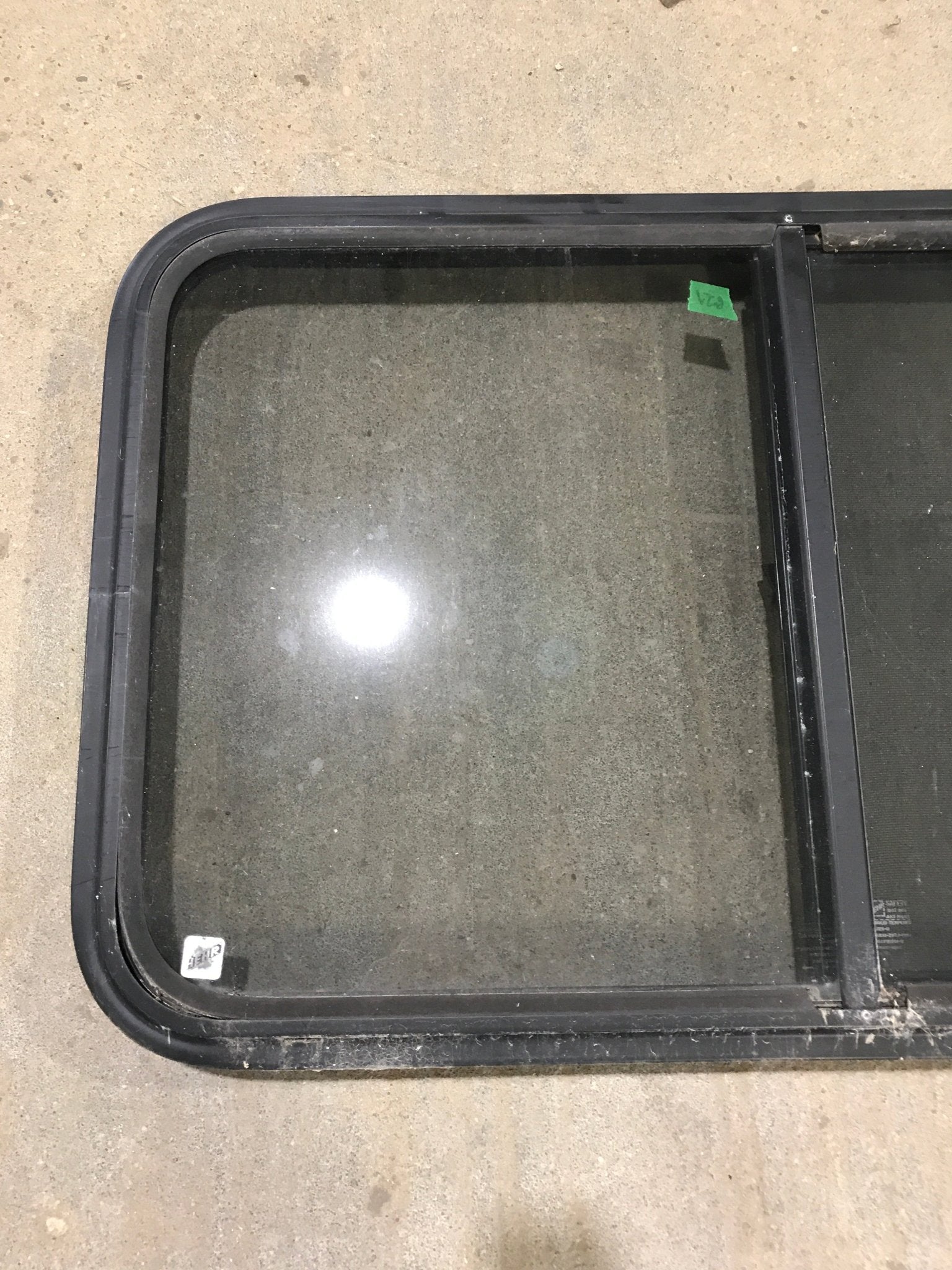 Used Black Radius Opening Window : 36 1/2" W x 22" H x 1 7/8" - Young Farts RV Parts