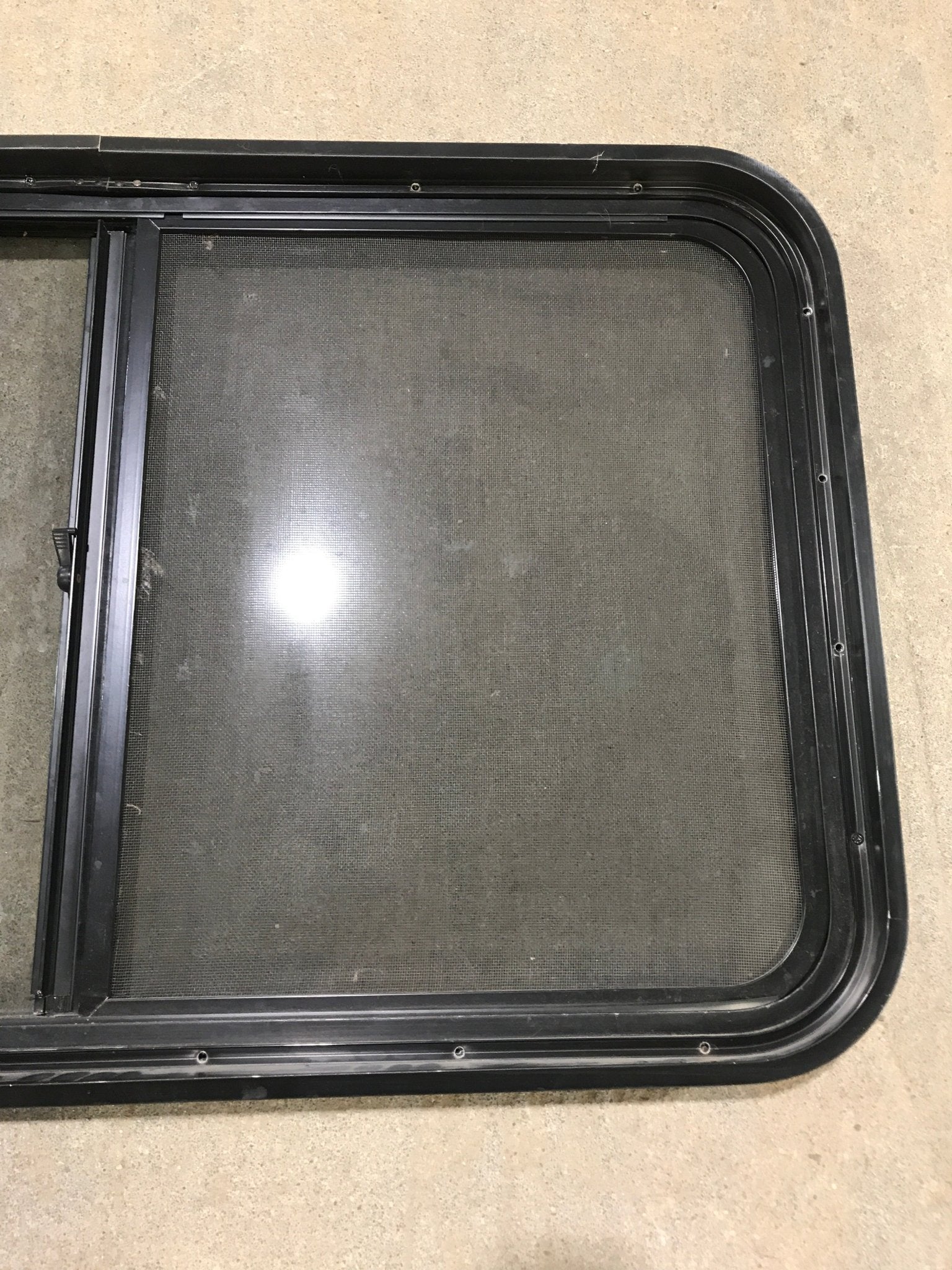 Used Black Radius Opening Window : 36 1/2" W x 22" H x 1 7/8" - Young Farts RV Parts