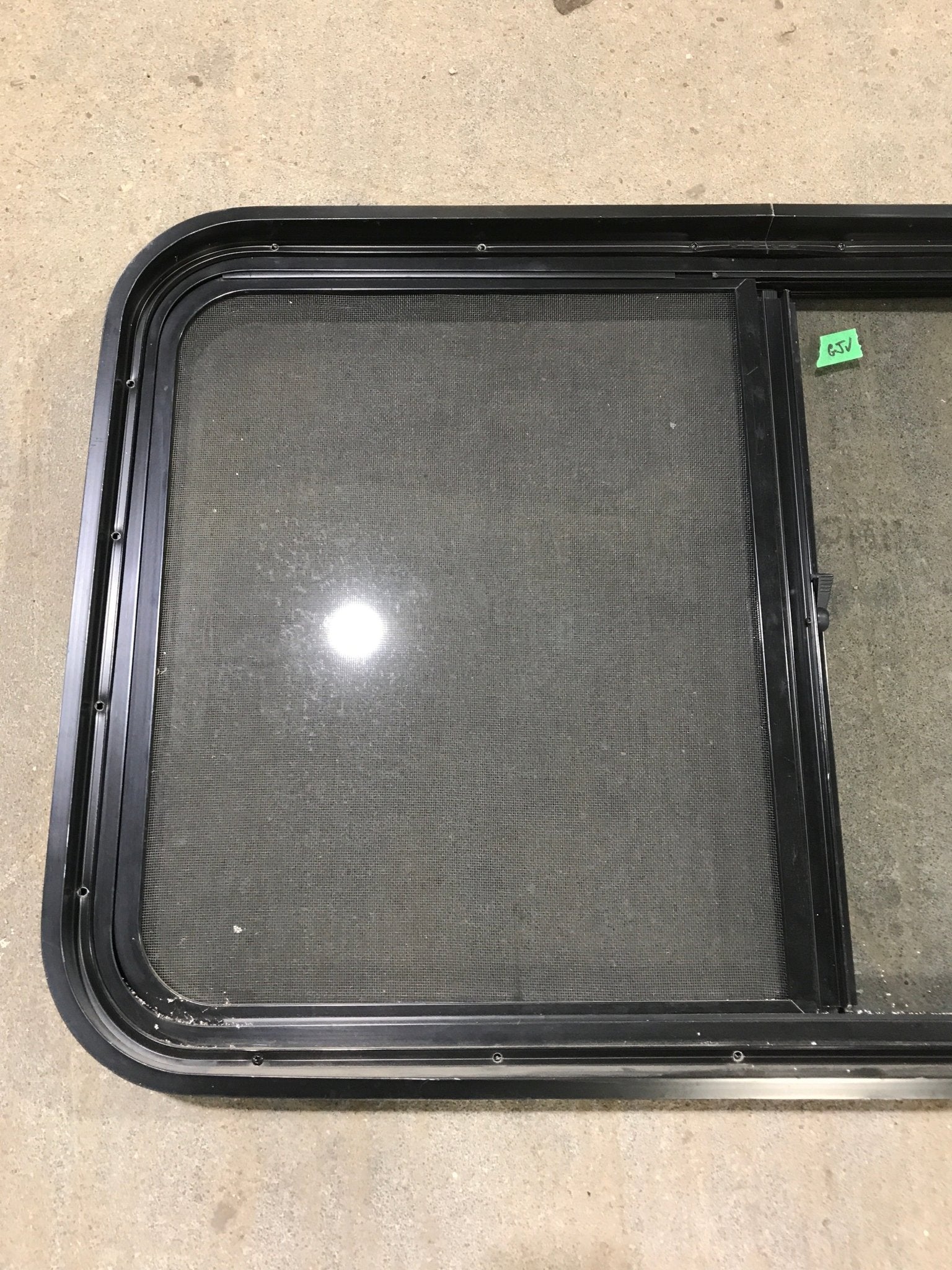 Used Black Radius Opening Window : 36 1/2" W x 22" H x 1 7/8" - Young Farts RV Parts
