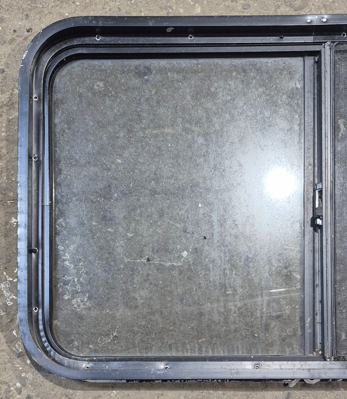 Used Black Radius Opening Window : 36 1/4" W x 21 3/4" H x 1 7/8" - Young Farts RV Parts