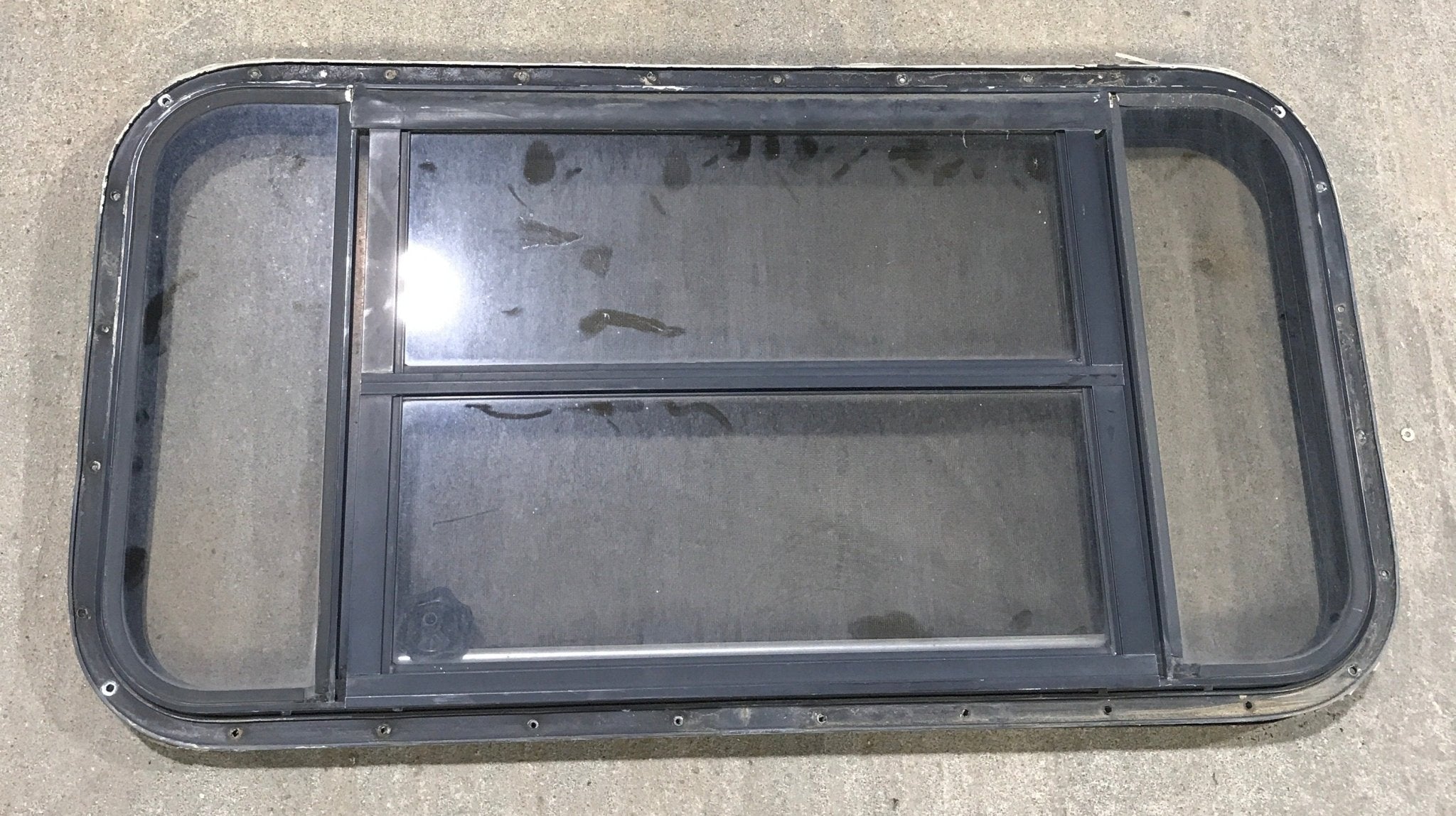 Used Black Radius Opening Window : 37" W x 19 1/4" H x 1 1/4" - Young Farts RV Parts