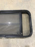 Used Black Radius Opening Window : 37" W x 19 1/4" H x 1 1/4" - Young Farts RV Parts