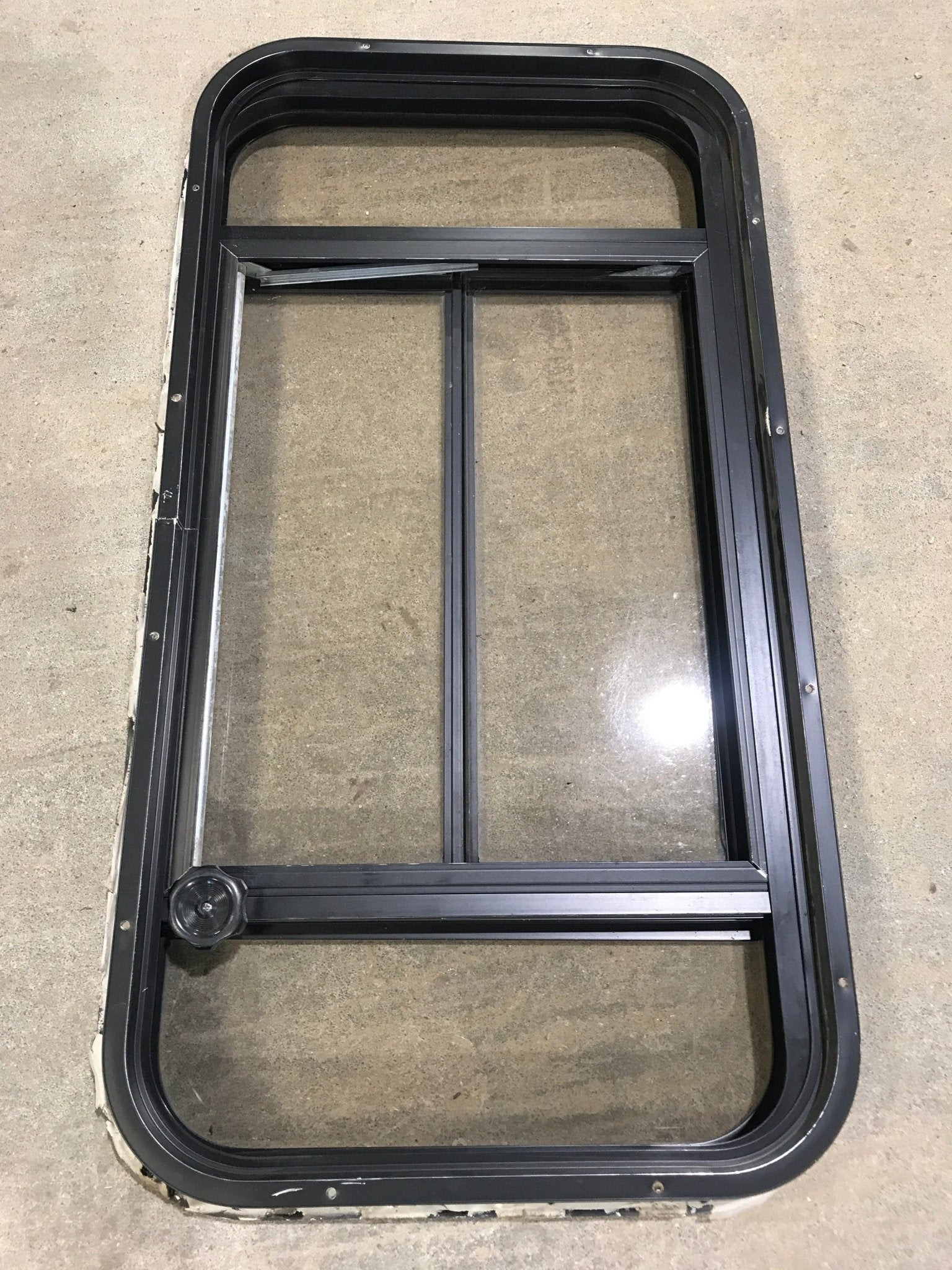 Used Black Radius Opening Window : 37" W x 19 1/4" H x 1 1/4" - Young Farts RV Parts