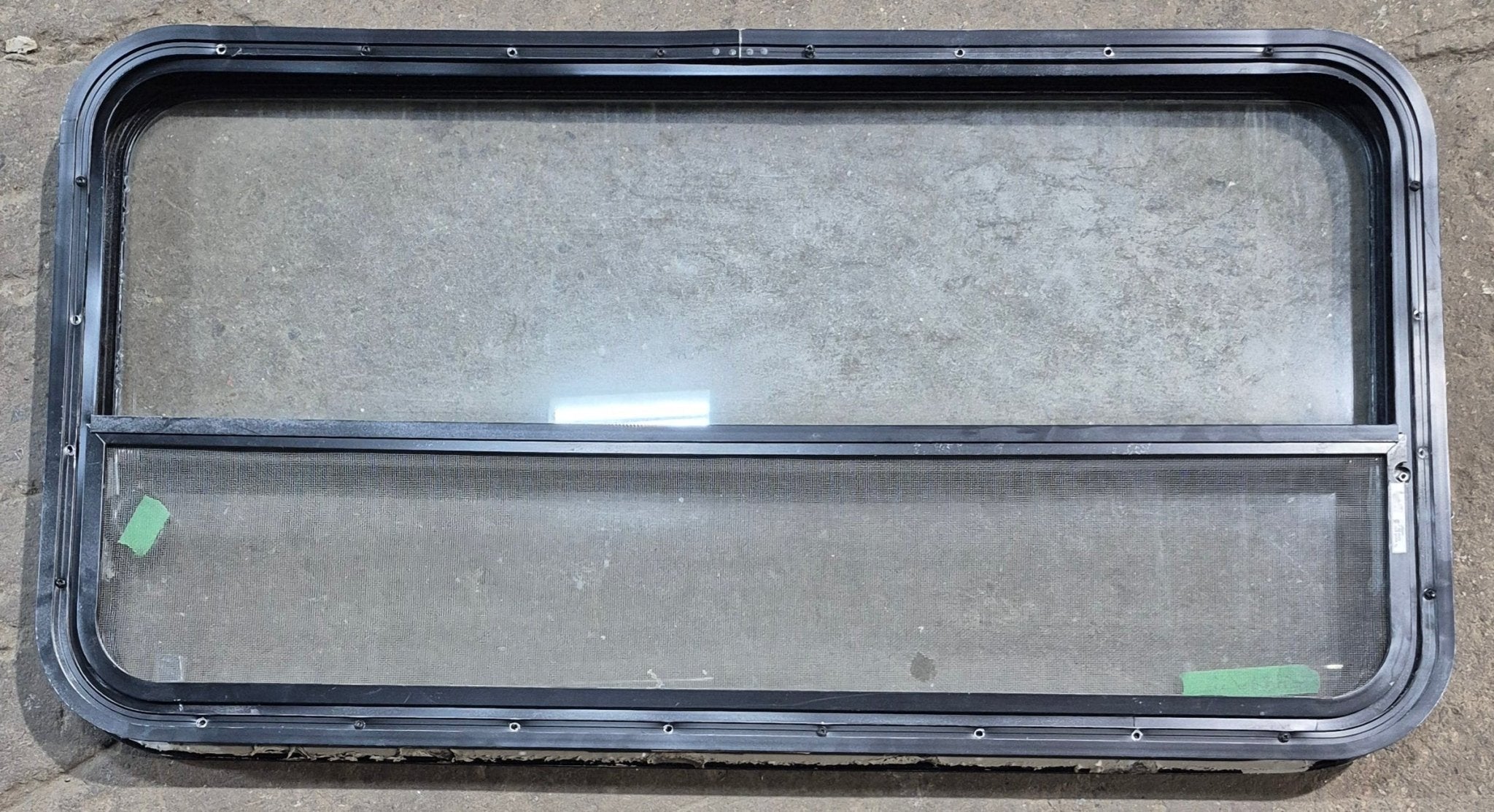 Used Black Radius Opening Window : 41 1/4" W x 21 1/2" H x 1 7/8" D - Young Farts RV Parts