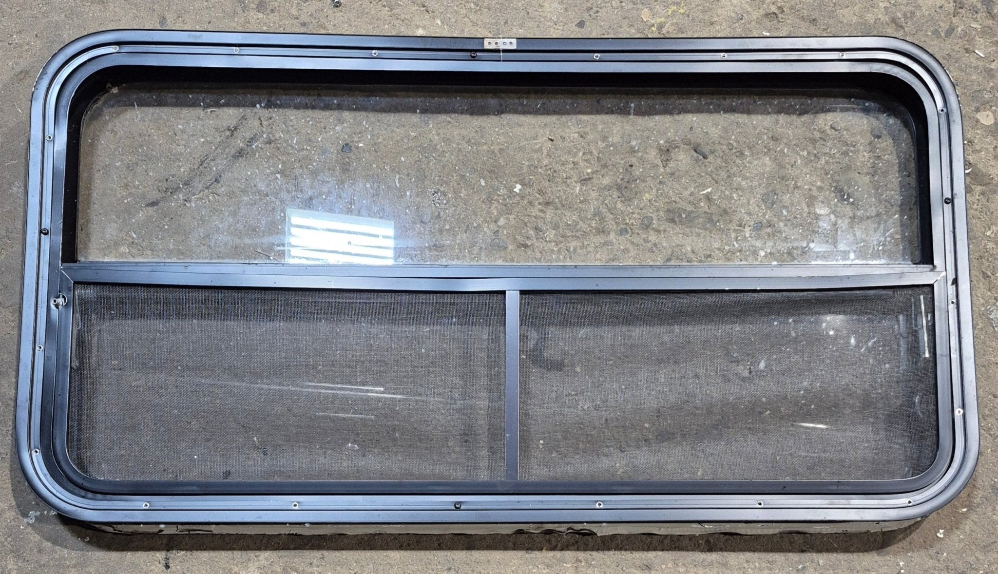 Used Black Radius Opening Window : 41 1/4" W x 21 1/4" H x 1 5/8" - Young Farts RV Parts