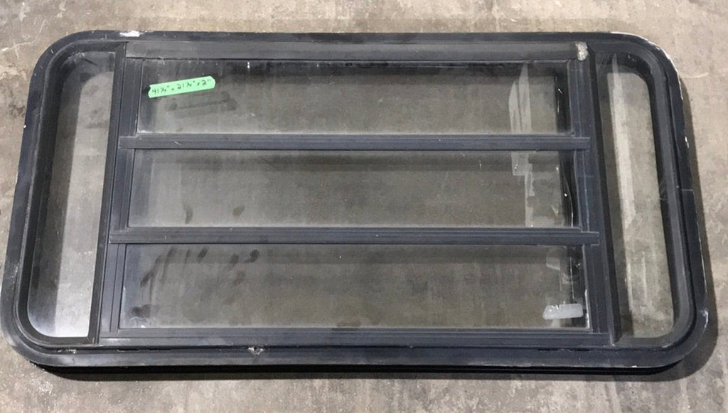 Used Black Radius Opening Window : 41 1/4" W x 21 1/4" H x 2" D - Young Farts RV Parts