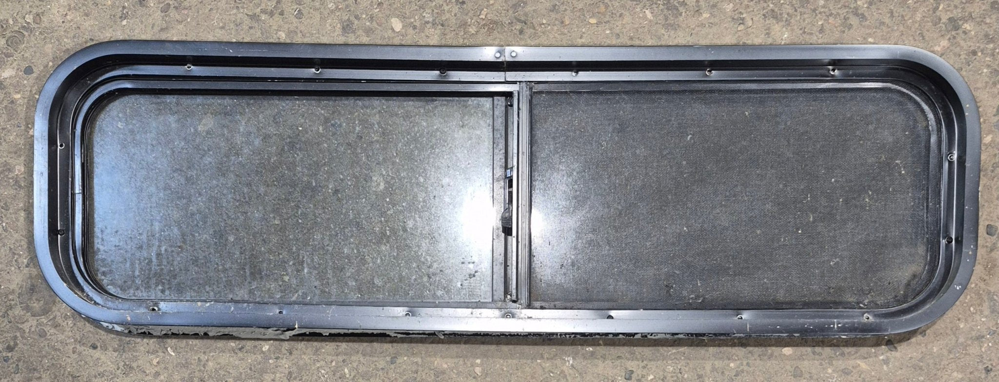 Used Black Radius Opening Window : 42 1/4" W x 11 3/4" H x 1 7/8" - Young Farts RV Parts