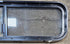Used Black Radius Opening Window : 42 1/4" W x 11 3/4" H x 1 7/8" - Young Farts RV Parts