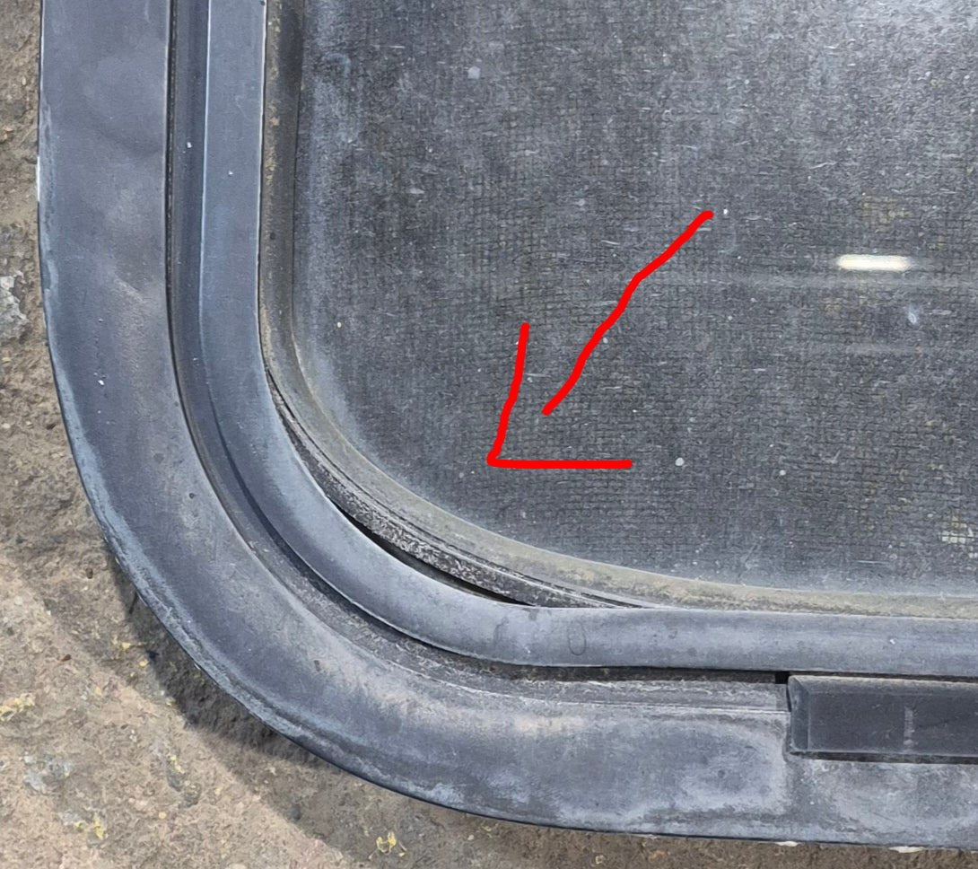 Used Black Radius Opening Window : 42 1/4" W x 11 3/4" H x 1 7/8" - Young Farts RV Parts