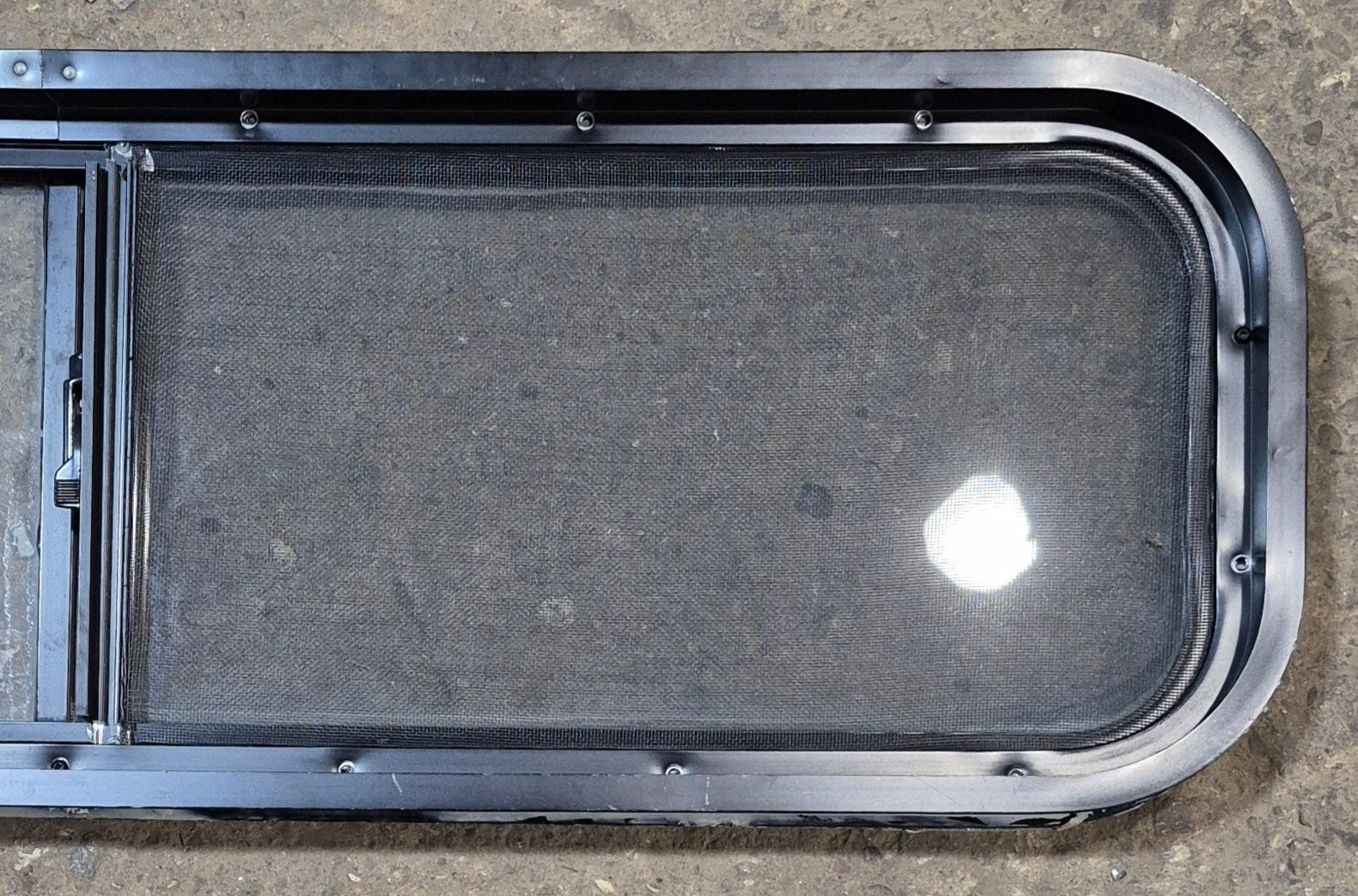 Used Black Radius Opening Window : 42 1/4" W x 11 3/4" H x 2" - Young Farts RV Parts
