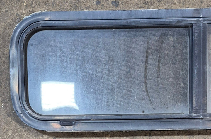 Used Black Radius Opening Window : 42 1/4" W x 11 3/4" H x 2" - Young Farts RV Parts