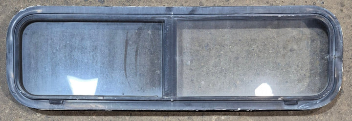 Used Black Radius Opening Window : 42 1/4" W x 11 3/4" H x 2" - Young Farts RV Parts