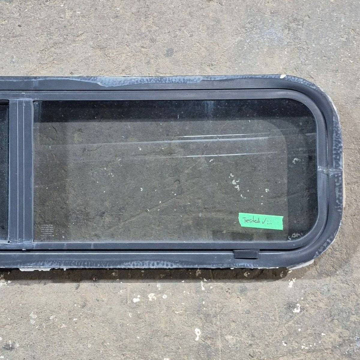 Used Black Radius Opening Window - 42 X 11 3/4 X 2 - Young Farts RV Parts