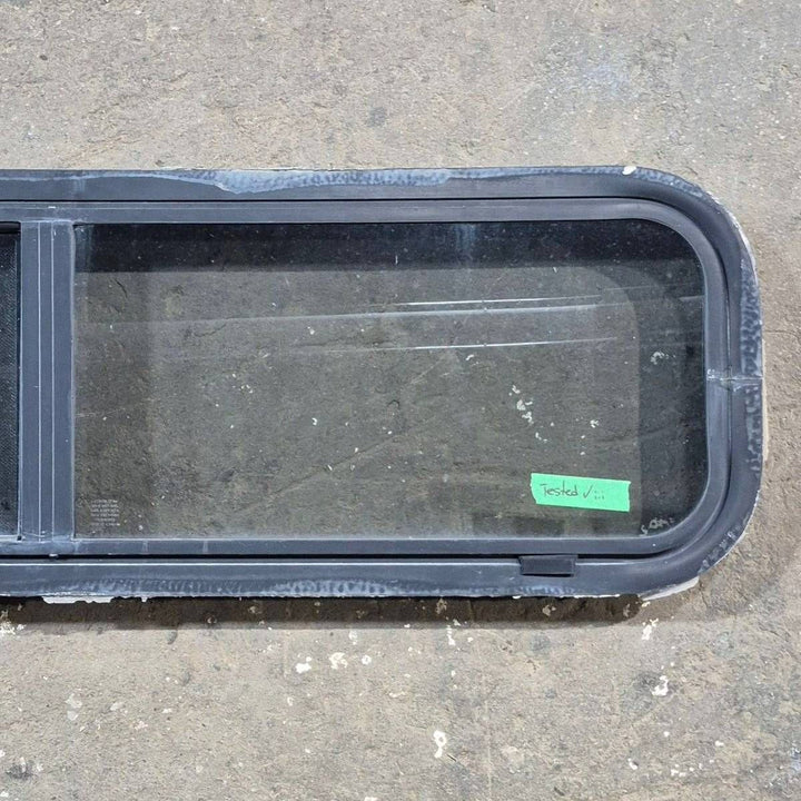 Used Black Radius Opening Window - 42 X 11 3/4 X 2 - Young Farts RV Parts