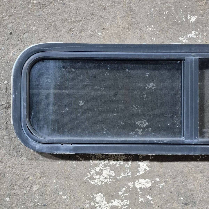 Used Black Radius Opening Window - 42 X 11 3/4 X 2 - Young Farts RV Parts