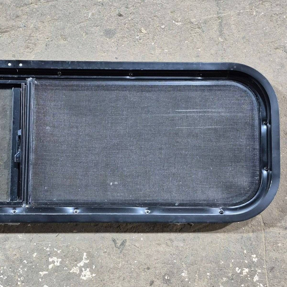 Used Black Radius Opening Window - 42 X 11 3/4 X 2 - Young Farts RV Parts