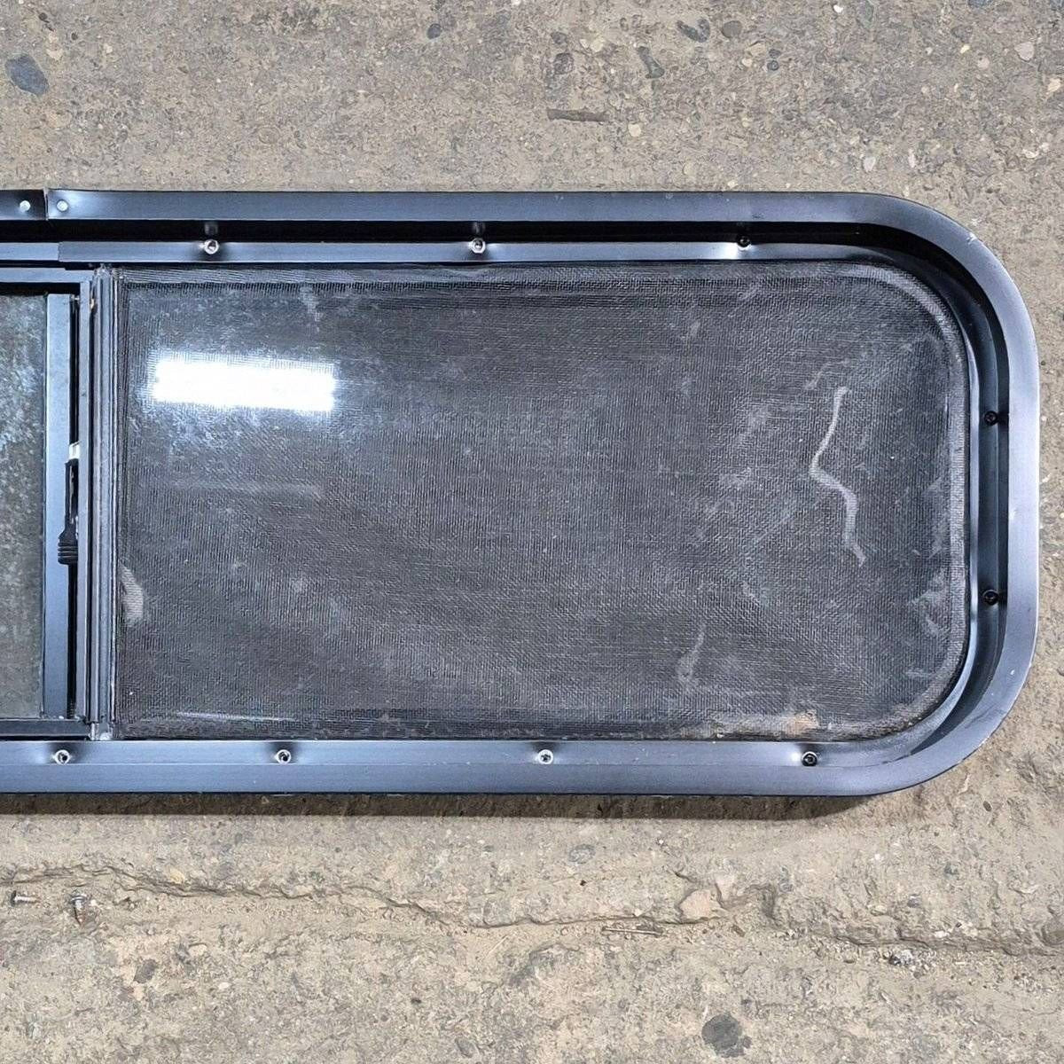 Used Black Radius Opening Window - 42 X 11.75 X 2 - Young Farts RV Parts